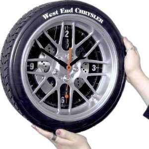   tire motif wall clock features three hand movement.