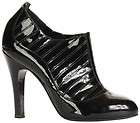 Shiny black patent leather spices up any outfit