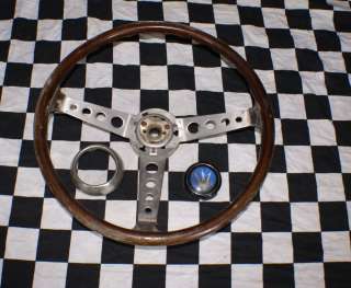 YOURE BIDDING ON RARE USED FIV STEERING WHEEL FOR A MASERATI GHIBLI 