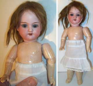   doll with her original jointed wood and composition body the head has