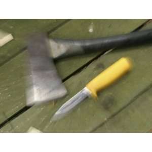  Unfocused Camp Axe and Fixed Blade Knife Photographic 
