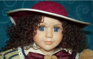 Collectible Porcelain Doll Curly Brown Hair/Blue Eyes  