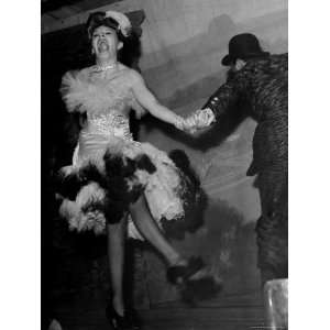 Comedienne Martha Raye Clad in Marabou Feather Fringed Cancan Dress 