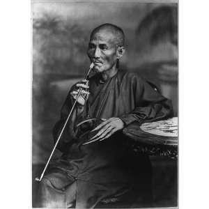   Old Chinaman,smoking long pipe,c1880,long fingernails