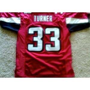  Michael Turner Autographed Uniform   Autographed NFL 