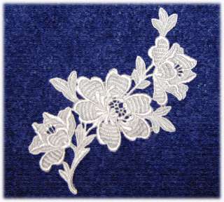   floral applique has intense stitching on every petal and leaf one of