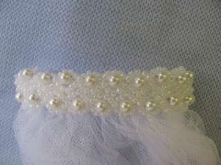 mint condition with swathes of tulle veil bouquet wrist booklet and 