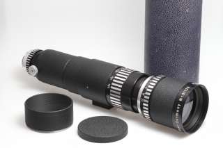 This lens will be delivered with lenshood, front cap, M42 mount and 