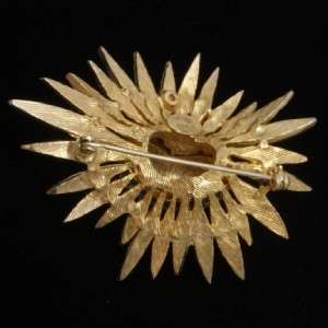 Goldtone flower with two textures of spiked petals and faux pearls at 