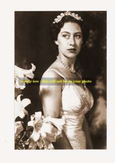 mm83  young Princess Margaret in gown wears diamonds & caries lilies 