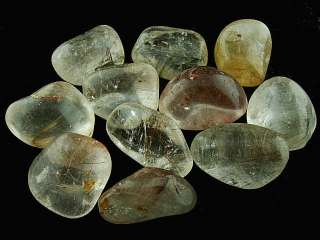 This sale is for a 1/2 pound of tumbled Rutilated Quartz per lot.