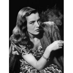 Ella Raines Smoking a Cigarette in the Motion Picture Brute Force 