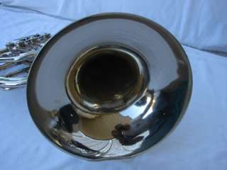 tuning adjustment the french horn shows light plating wear and 