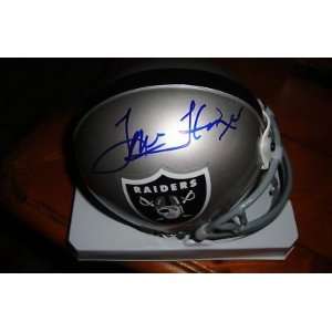  Autographed Tom Flores Mini Helmet   w coa   Autographed 