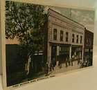 1920s Sutersville Pa. First National Bank & Main Street Repo Postcard