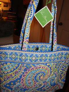 Handbag is in EXCELLENT NEW Condition with Retail Tags attached.