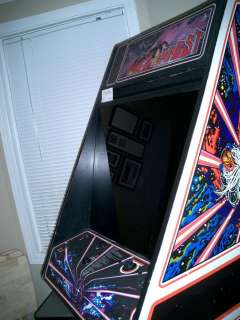   1981 Atari Tempest arcade game. The first color vector graphics game